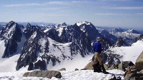 Climber on the Summit of Gannett Peak Wind River Range